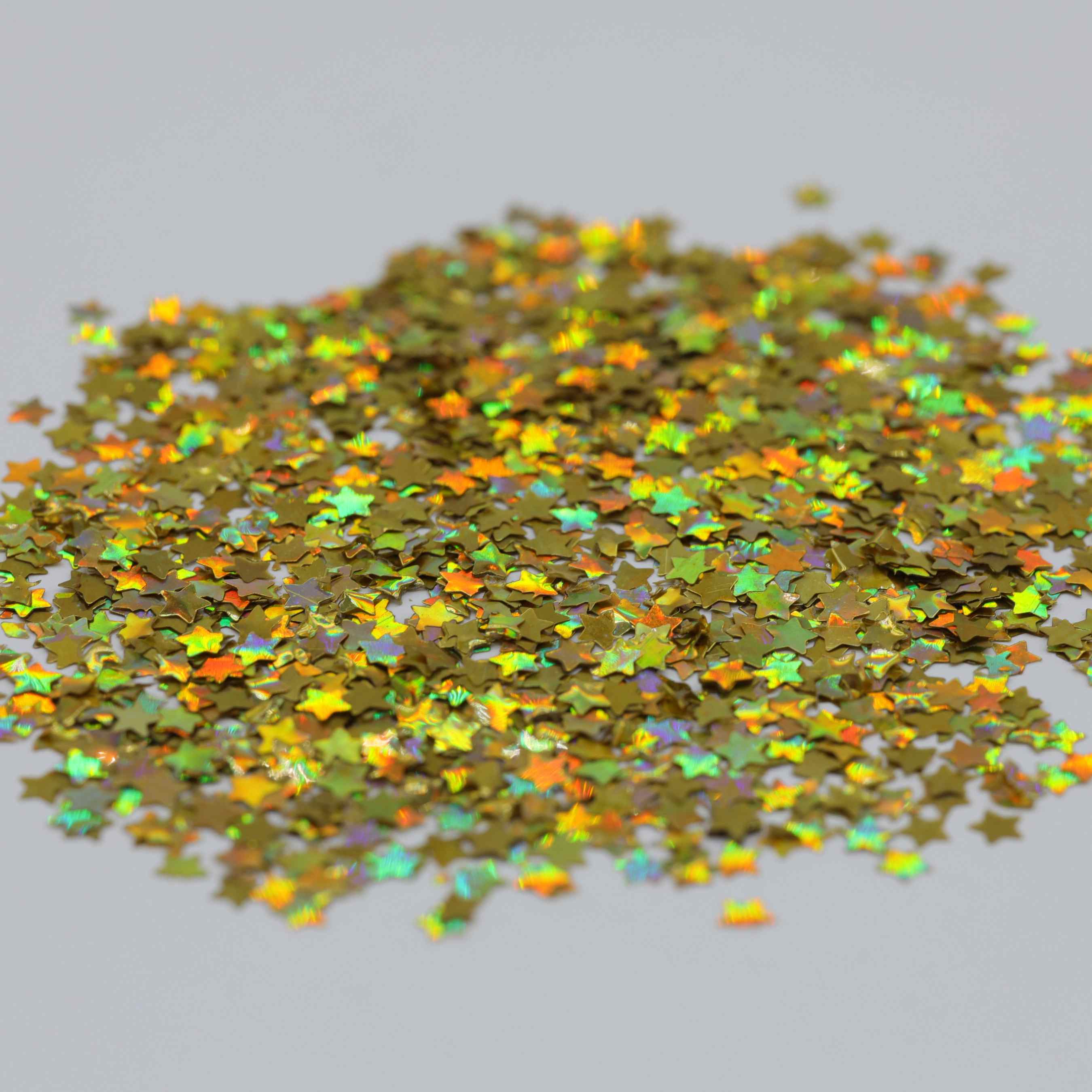 Paillettes étoiles dorées holographiques de 3 mm
